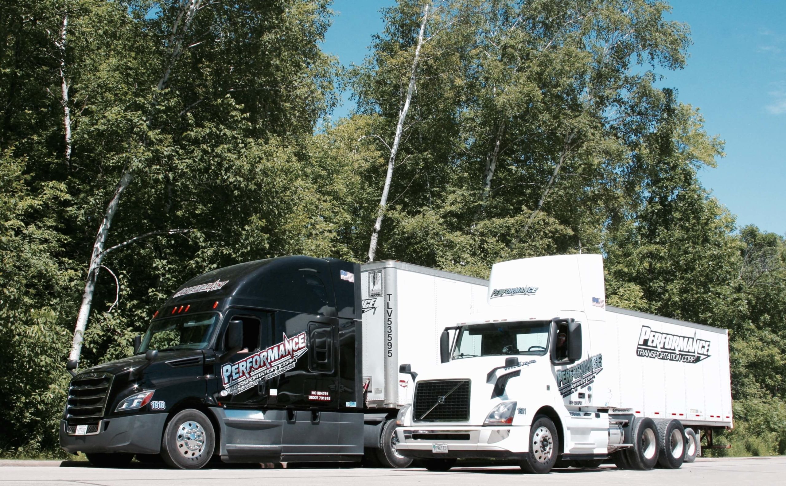 Performance LLC semi trucks delivering sustainable wood products and logistics solutions.